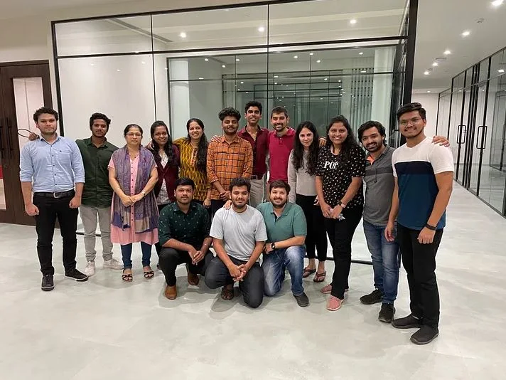 The Pinsaar team together at the office in late 2022