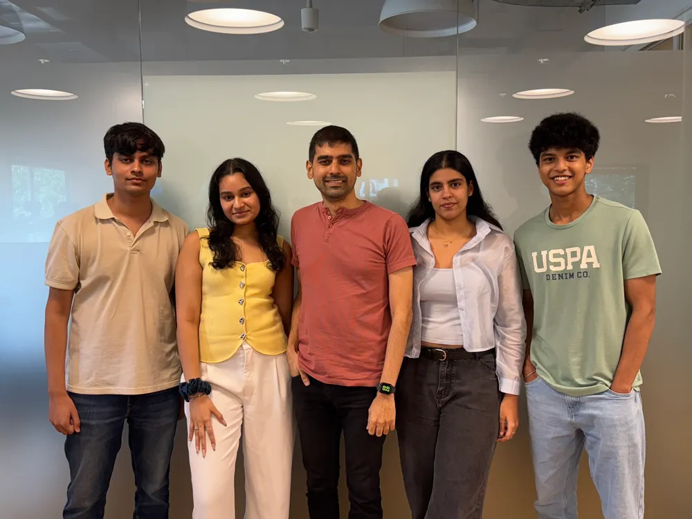The Pinsaar team together in August 2025